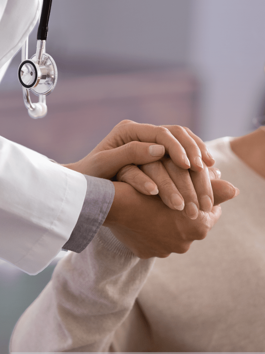 doctor comforting a patient
