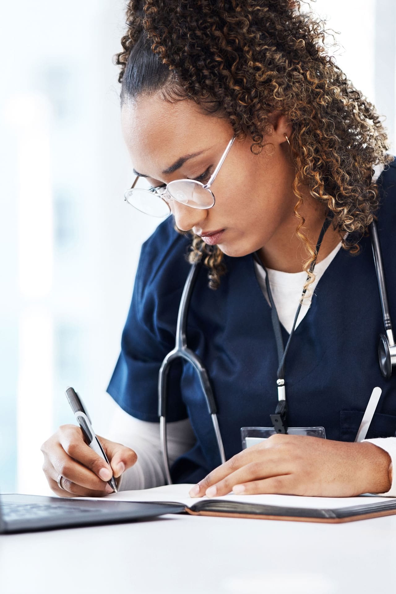 female doctor writing